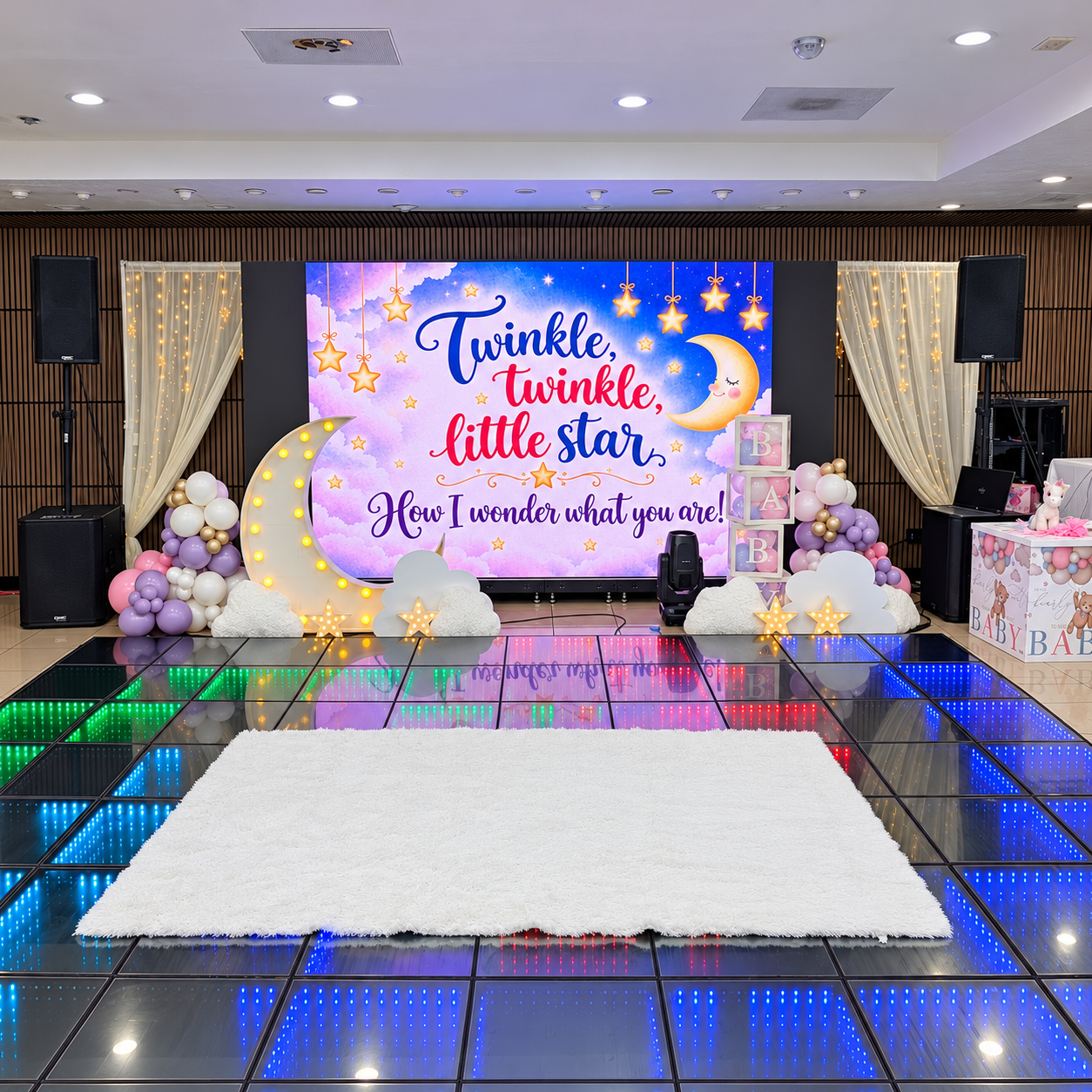 Twinkle Twinkle Little Star baby shower backdrop with pastel balloons, clouds, and illuminated moon and stars