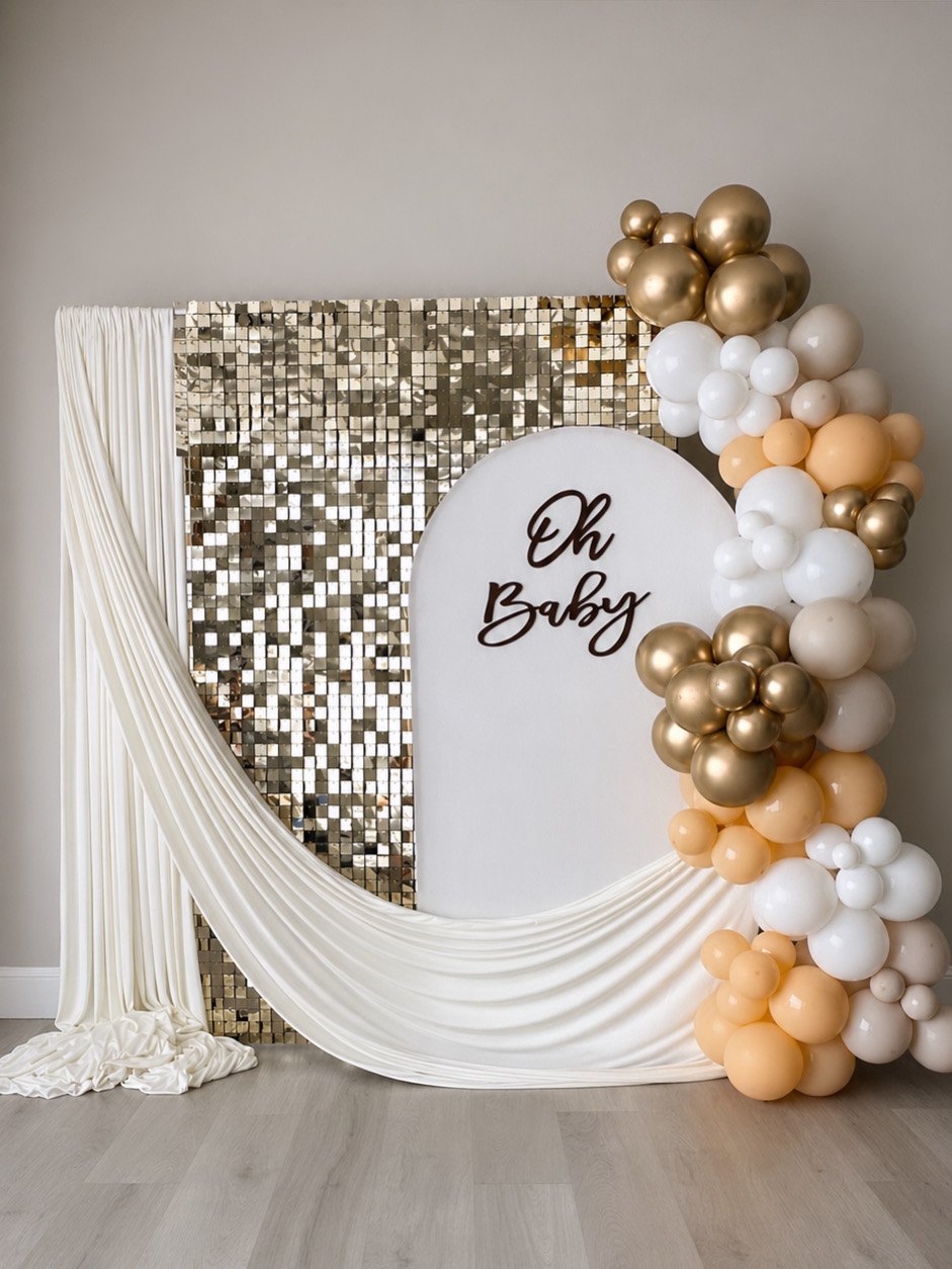 Oh Baby backdrop with balloons and gold shimmer