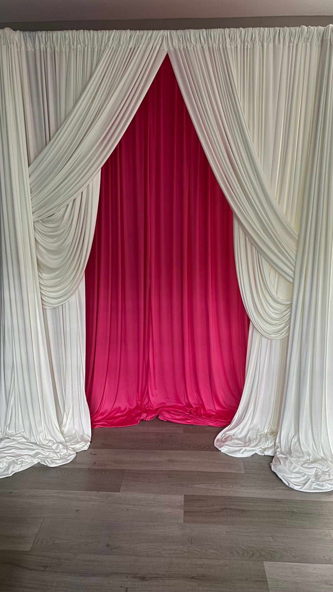 White and pink draped backdrop